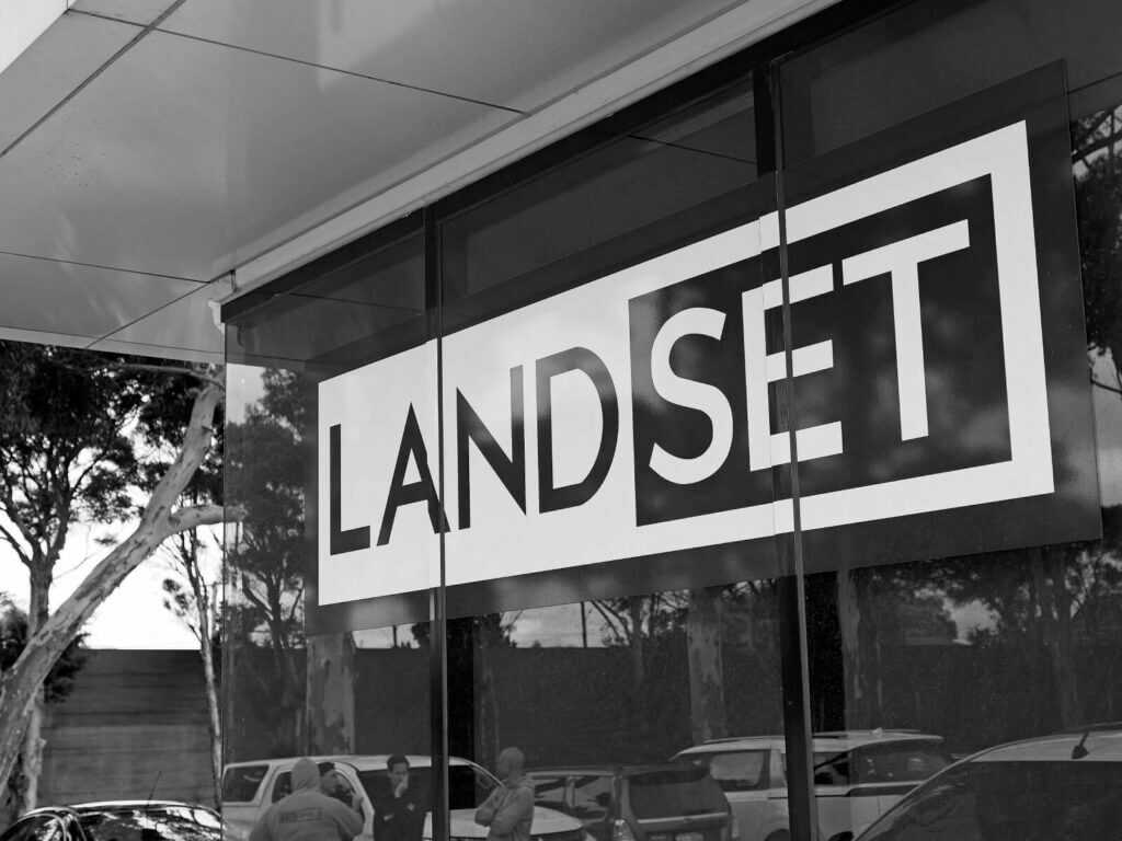 Land Set Logo on Office Building